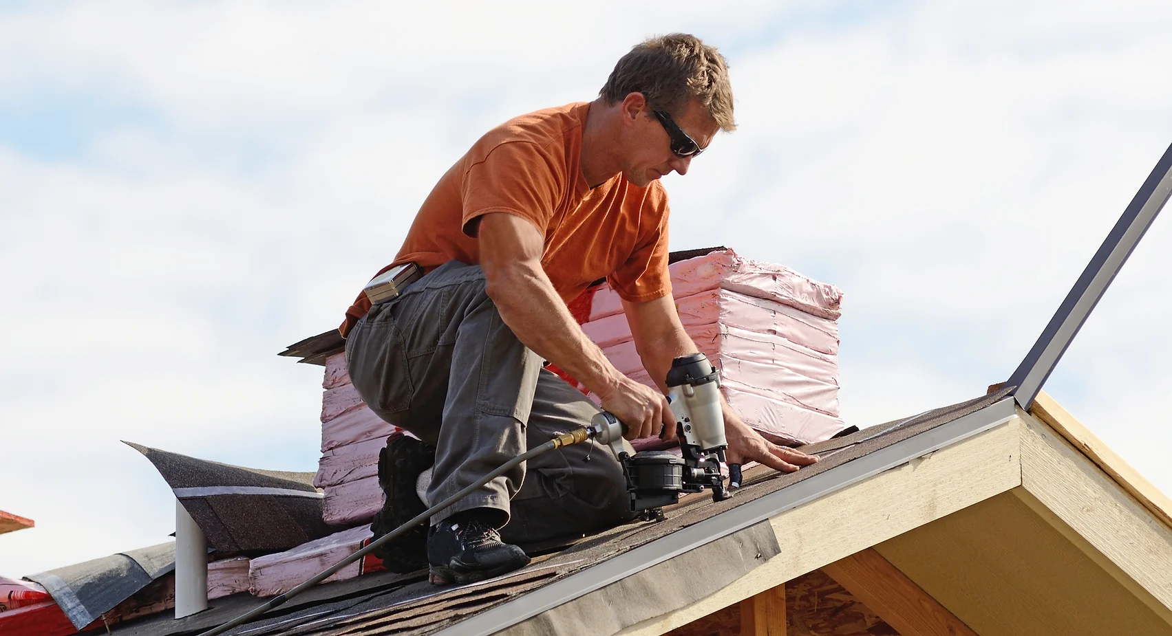 roofer-repairing-roof-2